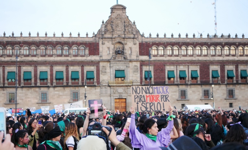 The recent killings of a 25-year-old woman and a 7-year-old girl have led to outrage in Mexico. A demonstration against femicides in Mexico City last November is pictured. // File Photo: Thayne Tuason via Creative Commons.