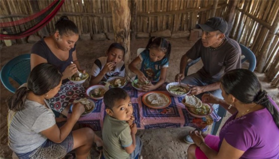 The Covid-19 pandemic may push millions of people into hunger in Latin America and the Caribbean, according to the United Nations World Food Program. A Salvadoran family that participates in a World Food Program initiative is pictured above. // File Photo: WFP.