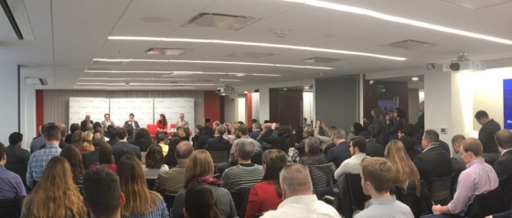 A packed conference room during the event 