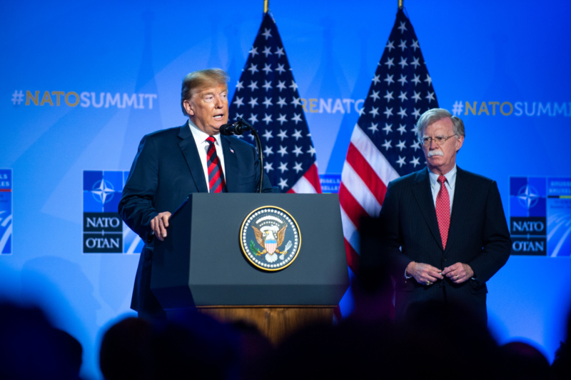 Press conference by US President Donald Trump at the NATO Summit in Brussels. Right: US National Security Advisor John Bolton