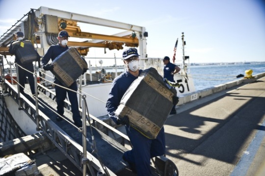 Members of the US military complete a drug interdiction of cocaine in the east pacific
