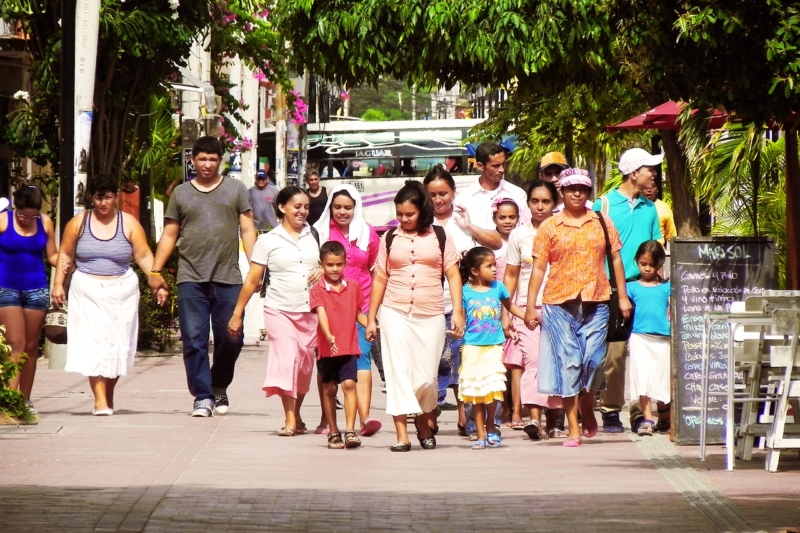 Latin American family walking together