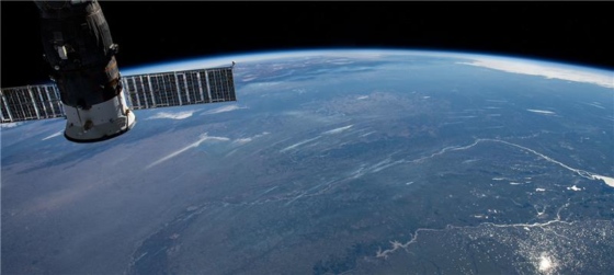 A photo of a satellite orbiting Earth.