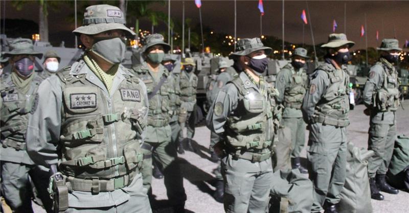 Venezuelan soldiers preparing for deployment are pictured.