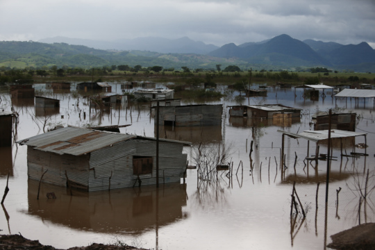 A flooded Central American village after Hurricane Eta