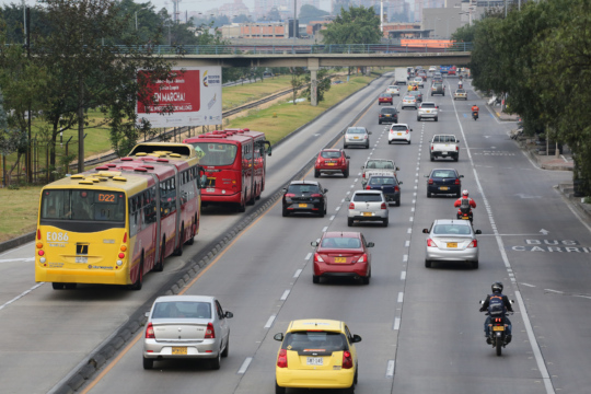 TransMilenio buses (left) near the Simon Bolivar station in Bogotá, Colombia