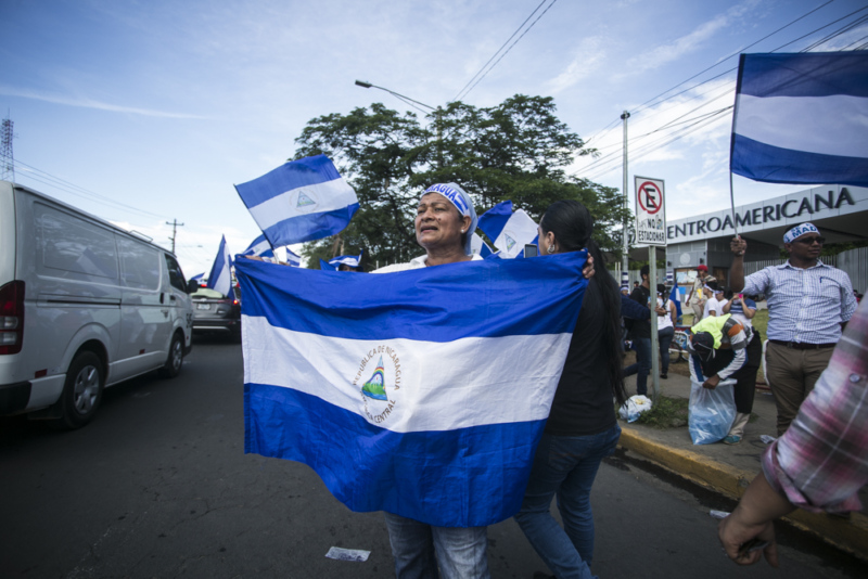 Photo of woman in Nicaraguan protests in 2018