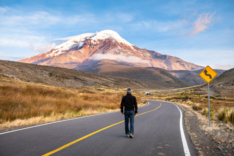 Photo of man walking on road at Chimborazo Mountain, Ecuador
